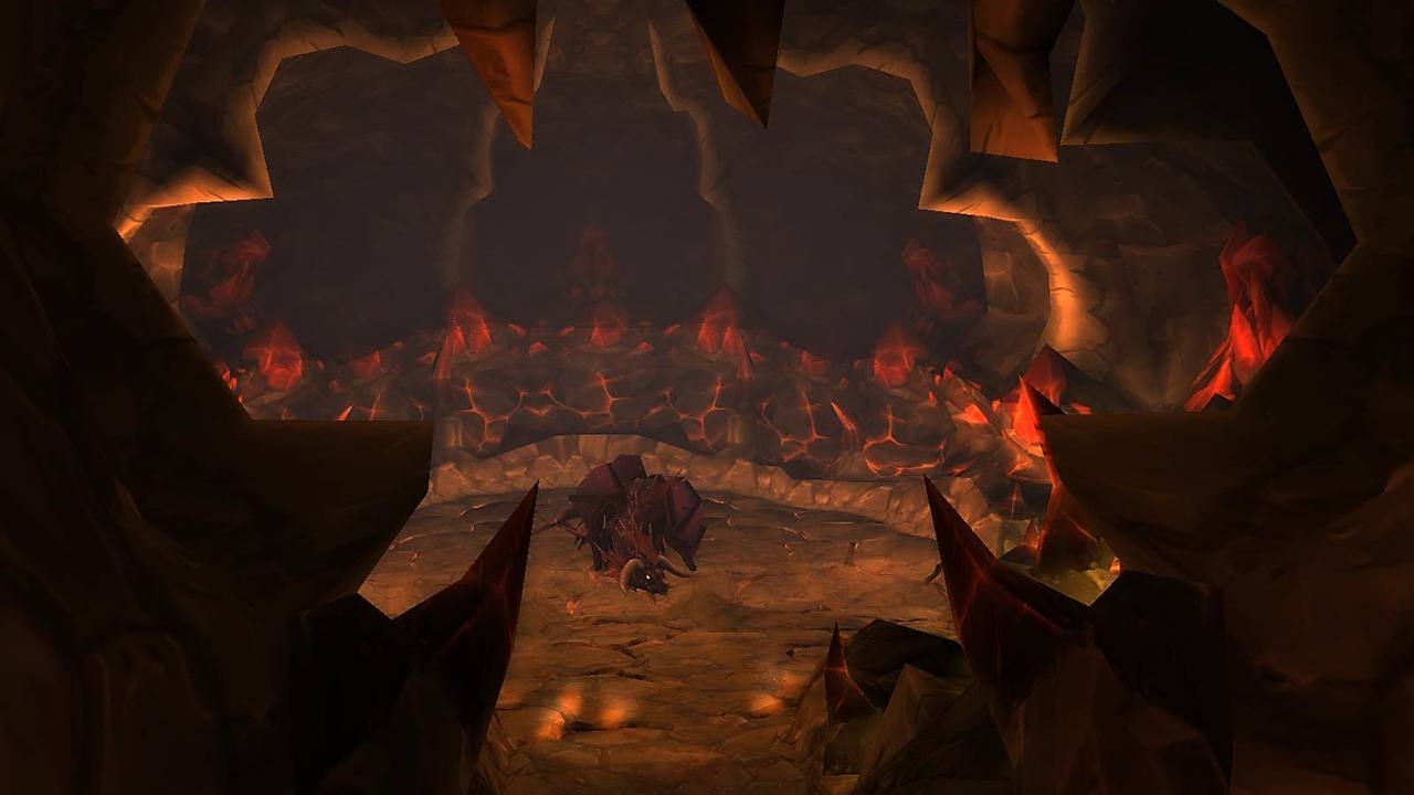 Onyxia en el centro de su guarida, entre grietas de lava.